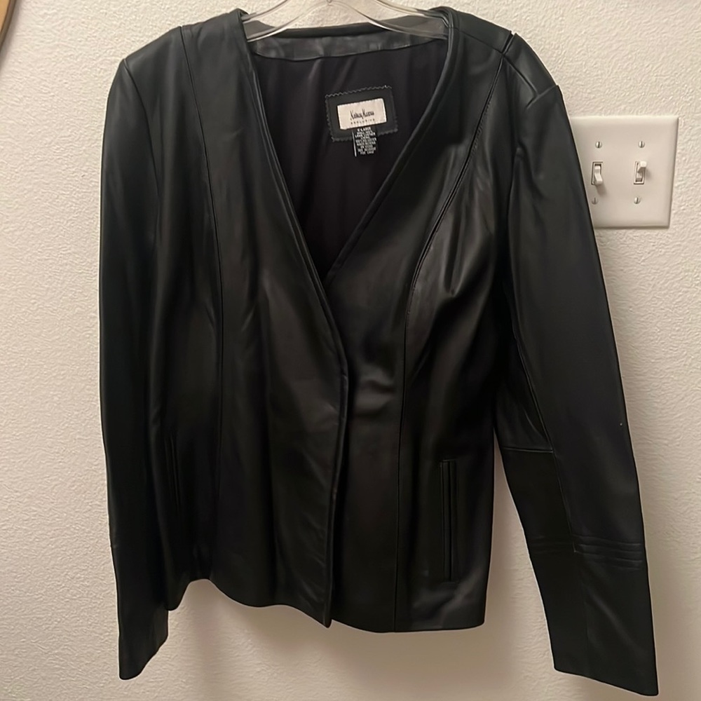 Neiman Marcus XL black leather mid length leather coat in excellent condition.